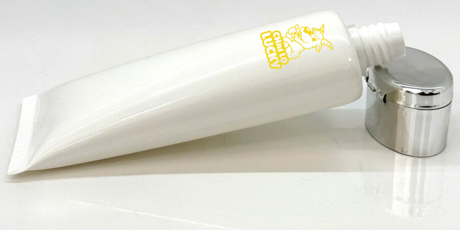 mô tả Tuýp Nhựa Trắng Nắp Bật Xi Bạc 100ml